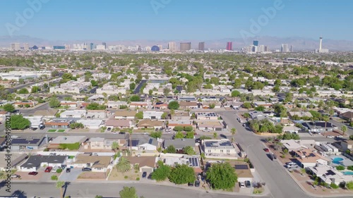 Las Vegas Neighborhood Pullback Aerial with Strip Skyline and Mountain View 03