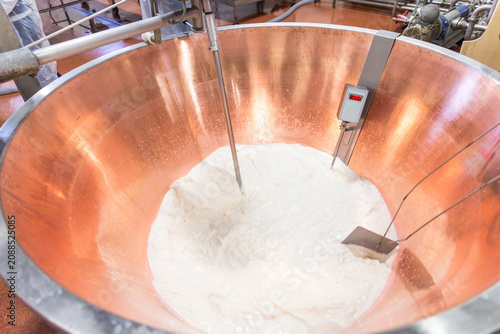 фотографія Parmesan cheese prduction process in Bologna Italy