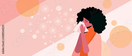 Woman sneezing while holding tissue with allergy symptoms in spring  