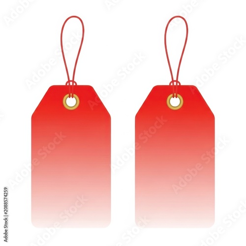Two red sale tags hanging on a string with golden circular fasteners