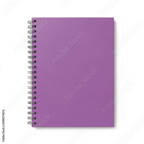 A spiral-bound purple notebook standing upright against a white background
