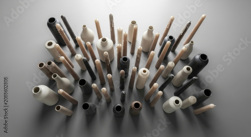 Minimalist Collection Of Ceramic Vases And Taper Candles With Neutral Tones
