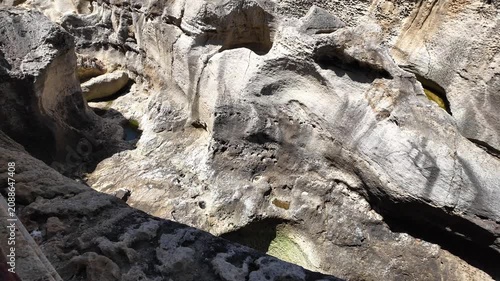 Wied il Mielah, Gharb, Gozo - Valley near limestone natural arch on the north-western coast of the island of Gozo in Malta. High quality 4k footage
