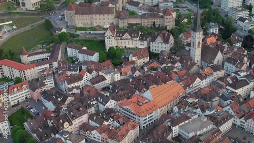 Aerial panoramic view above the old town around the city Chur in Switzerland on a sunny summer afternoon. 