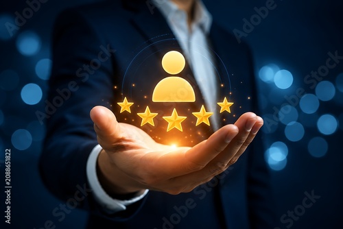 Businessman hand showing five star rating and human icon symbol in glowing virtual interface for customer service quality.