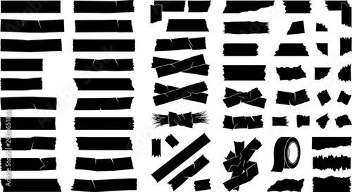 Foto Collection of various black tape strips and torn paper pieces for graphic design