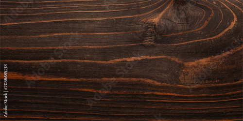 Vászonkép Dark brown rustic wooden plank texture with natural wood grain, weathered knots