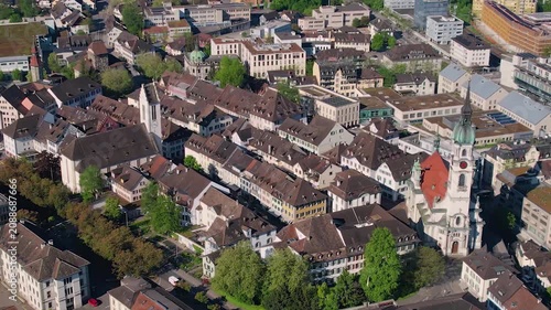 Aerial panoramic view above the old town around the city Frauenfeld in Switzerland on a sunny summer afternoon. 