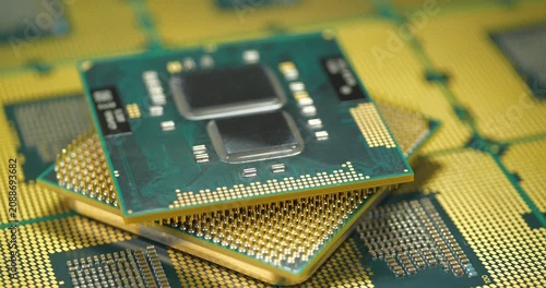 Central processing units with golden pins and contacts for a personal computer, essential for computing tasks