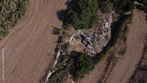 Naxar, Malta 01.07.2026 - Salini Catacombs aerial view of the field. This group of burials is situated in an area known as Ta’ Latnija. High quality 4k footage
