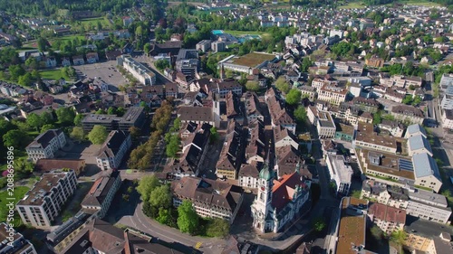 Aerial panoramic view above the old town around the city Frauenfeld in Switzerland on a sunny summer afternoon. 
