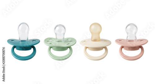 Foto Four baby pacifiers in pastel colors, isolated on transparent background