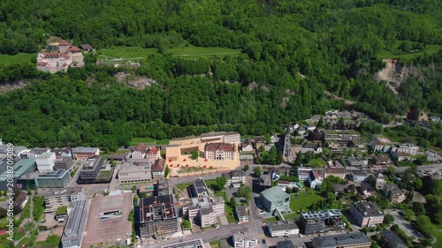 Aerial panoramic view above the downtown around the capitol city Vaduz in Liechtenstein on a sunny summer afternoon. 