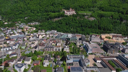 Aerial panoramic view above the downtown around the capitol city Vaduz in Liechtenstein on a sunny summer afternoon. 