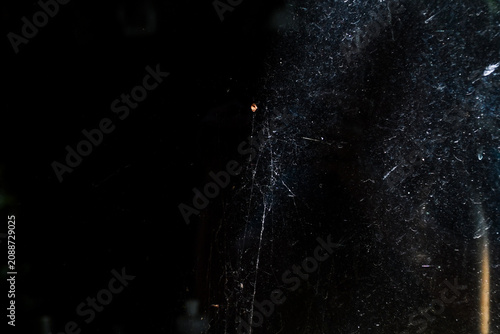 Black grunge texture with white scratches