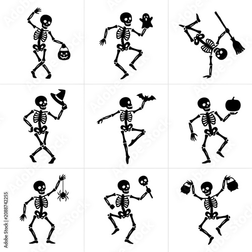 Fotografia Nine Black Silhouette Skeletons Holding Halloween Props Against A White Backgrou