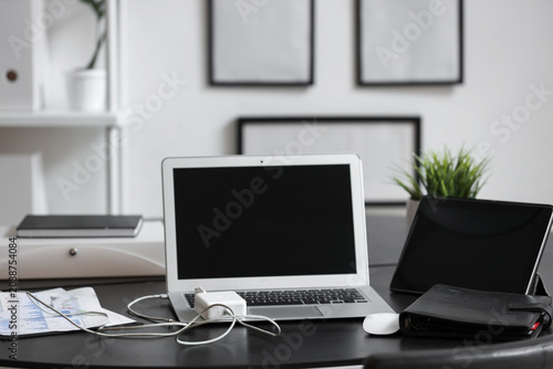 Modern laptop with tablet, ...