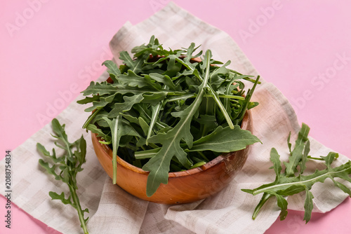 Wooden bowl with fresh arug...
