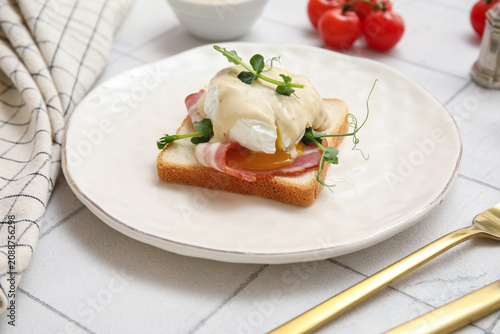 Plate with tasty egg Benedi...