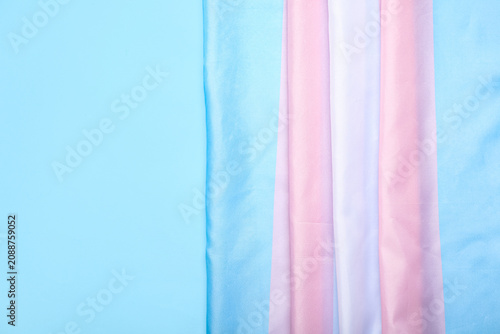 Transgender flag on blue ba...