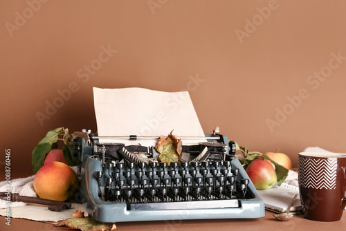 Vintage typewriter, cup of ...