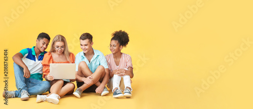 Group of teenagers sitting ...