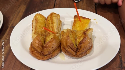 Serving Crispy Grilled Plantain and Toasted Bread Slices on Plate