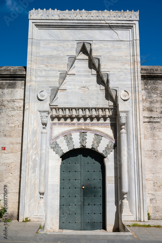 vertical photo of a ottoman buidling entrance details and decorations.