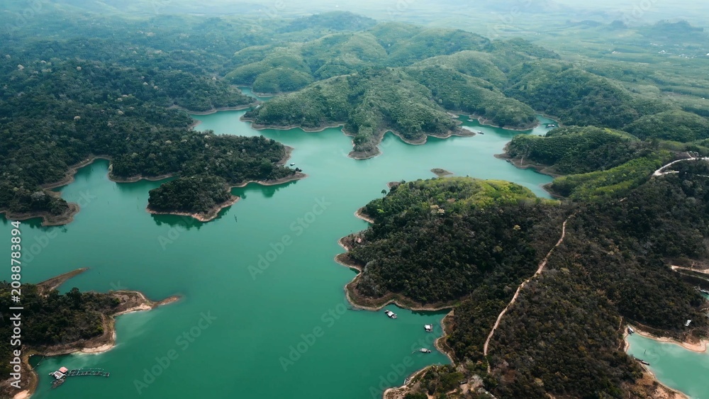 Fototapeta premium Khao sok lake aerial view showing tropical rainforest islands and emerald water