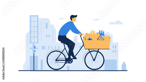 Man riding bicycle with groceries in city