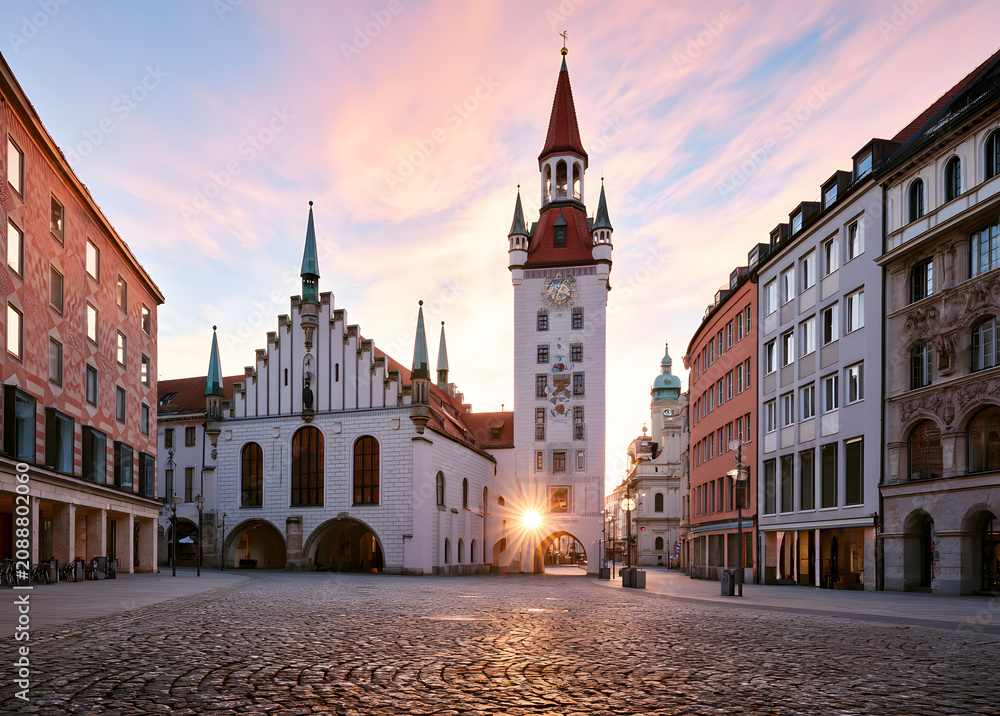 Fototapeta premium At sunrise, Munich and its Old Town Hall, including the tower, Bavaria, Germany - view of Marienplatz