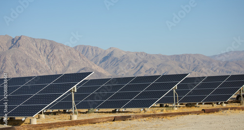 Solar panels or photovoltaic module. Solar panels mounted on large ground mounts.