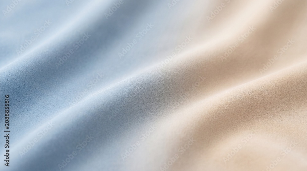 Fototapeta premium Close up of soft blue and beige fabric texture with elegant folds