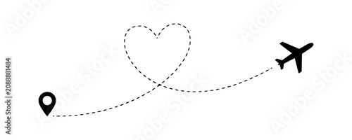 A black airplane flying in a heart-shaped path