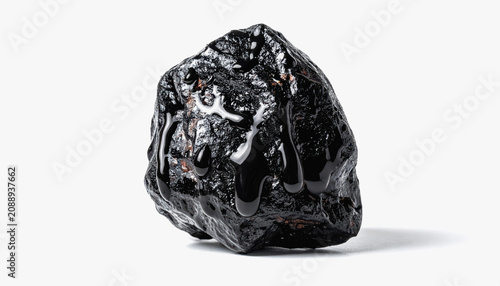 Wet Black Rock Covered in Dark Oily Liquid with Drips