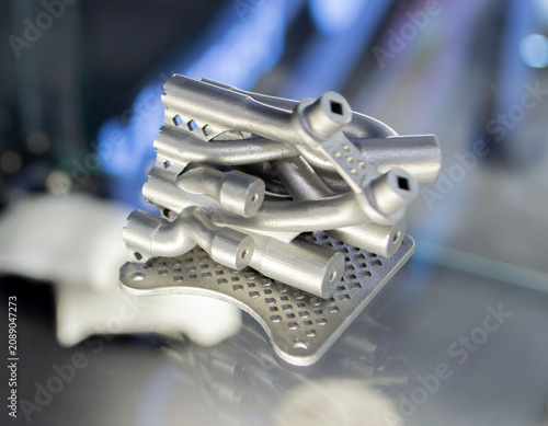 Foto Object prototype hydraulic manifold printed on 3D printer