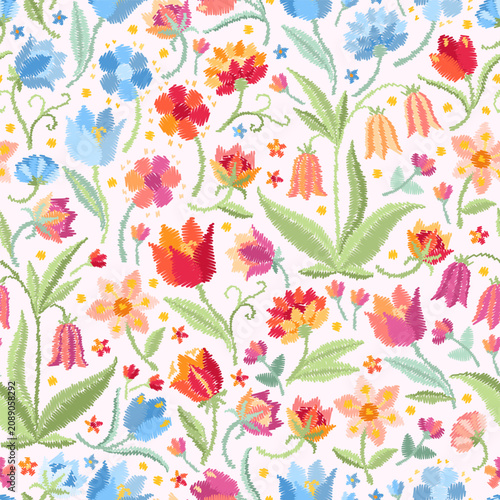 Embroidered seamless pattern with floral motifs. Beautiful print for fabric. 