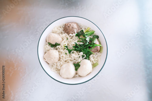 Photos Malaysian-style fish ball noodle soup with chewy meatballs, fresh greens, and ra