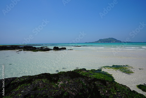 shoaling beach and clear water and island