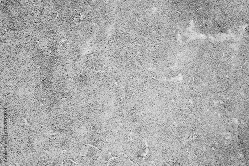 Tableau sur toile Cracked concrete surface with visible texture and small debris
