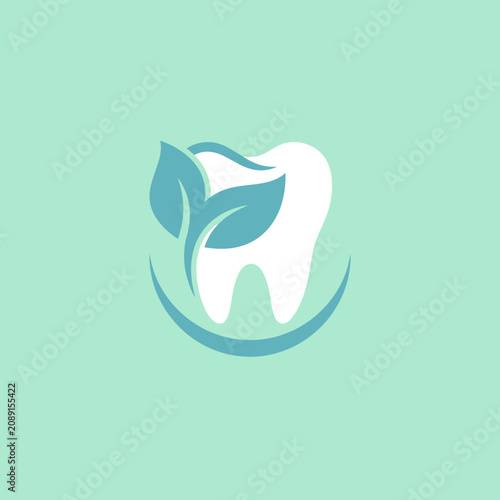 Minimalist dental logo featuring a white tooth and green leaves