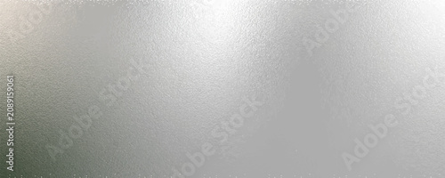 Quadro su tela Shiny silver foil metallic texture - glossy gray steel gleaming surface, frosted glass effect with blur glare reflection, bright polished metal material