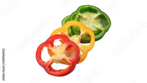 Принти на полотні Fresh sliced red and green bell pepper rings isolated on transparent background