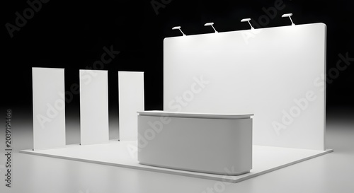 Empty white exhibition stand with spotlights and promotional banners, ready for branding and display at a trade show.