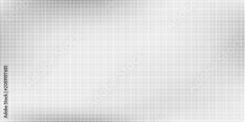 Modern dotted halftone gradient texture. Vanishing polka dot background. Repeating dots gradation pattern background art