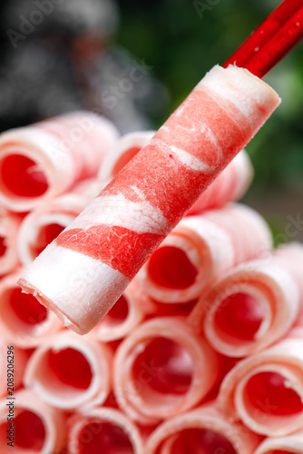 Premium Marbled Beef Rolls with Chopsticks for Hot Pot Cooking