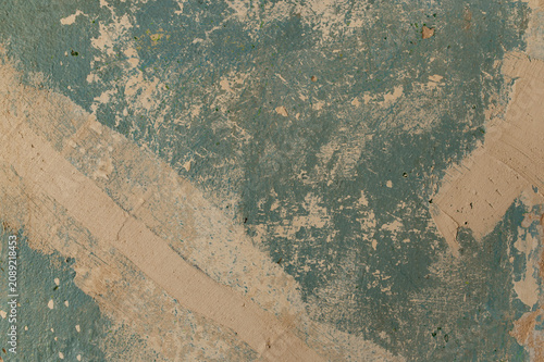 Cuadro en lienzo Weathered paint peels off rough beige wall