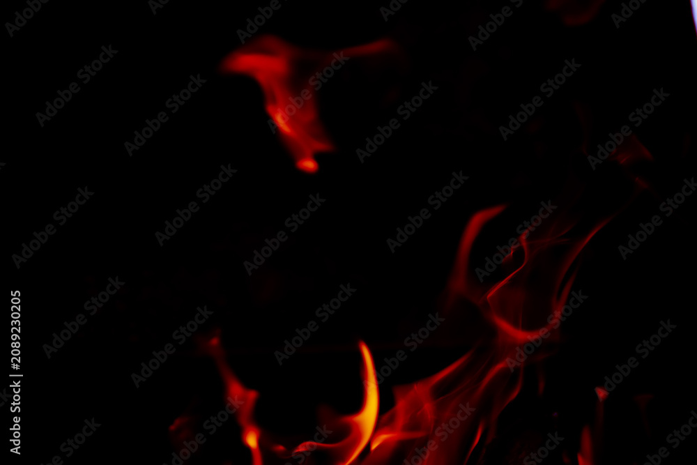 Fototapeta premium Background of the flame in the oven. Overlay layer. Tongues of fire in a fireplace.
