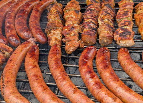Sizzling Polish Kielbasa and Pork Skewers Grilling