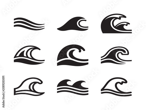 Set of solid black wave silhouettes representing ocean water movement style